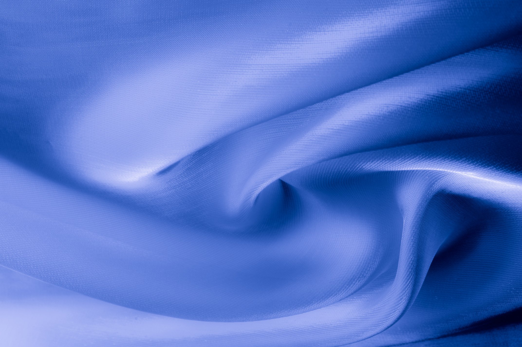 Texture, background, pattern. Pale blue clear silk cloth. SKY BLUE, also known as PALE BLUE, BABY BLUE, POWDER BLUE
